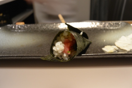 Tuna hand roll with chopped shiso leaf